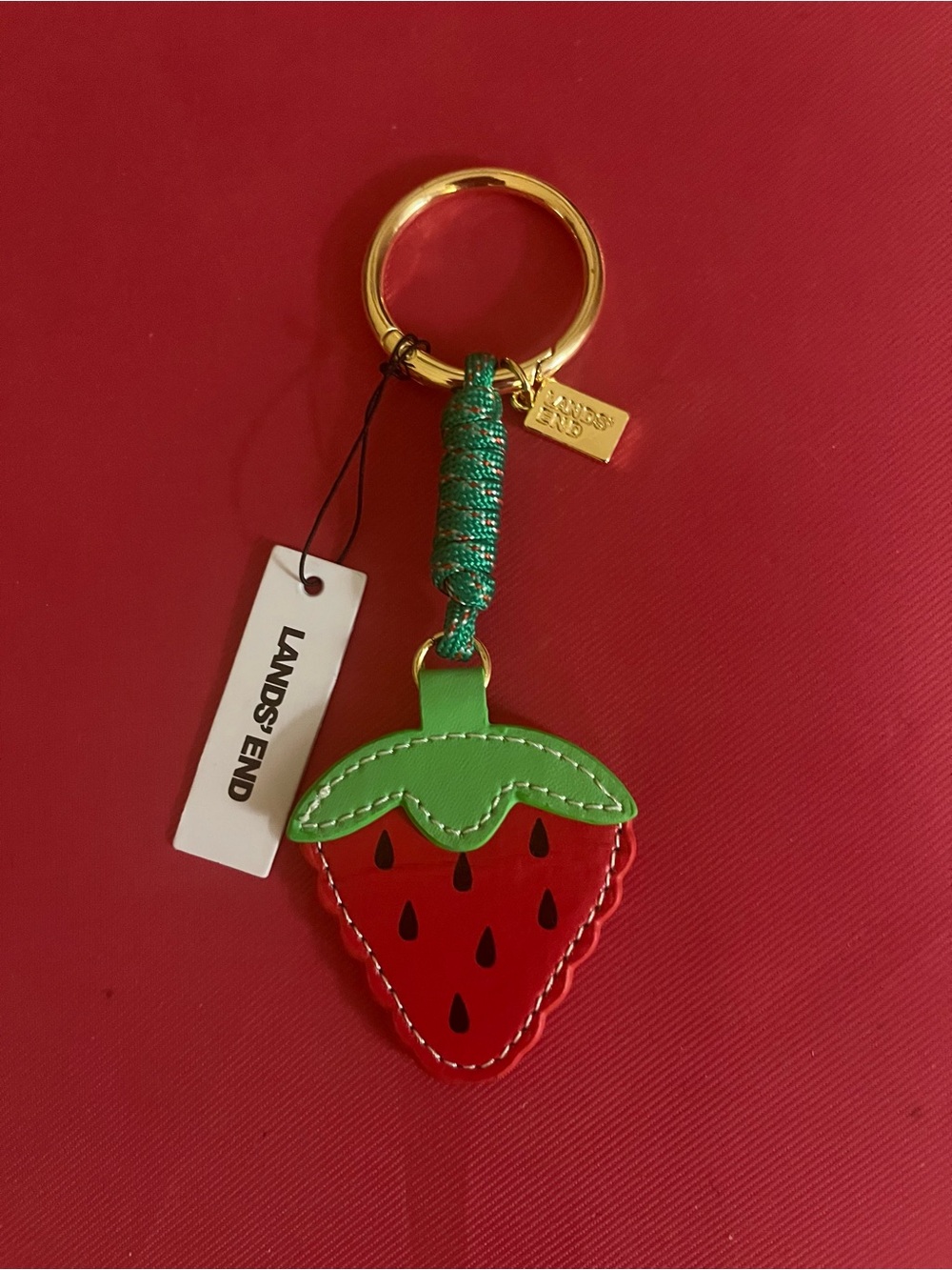 Land’s End strawberry bag charm